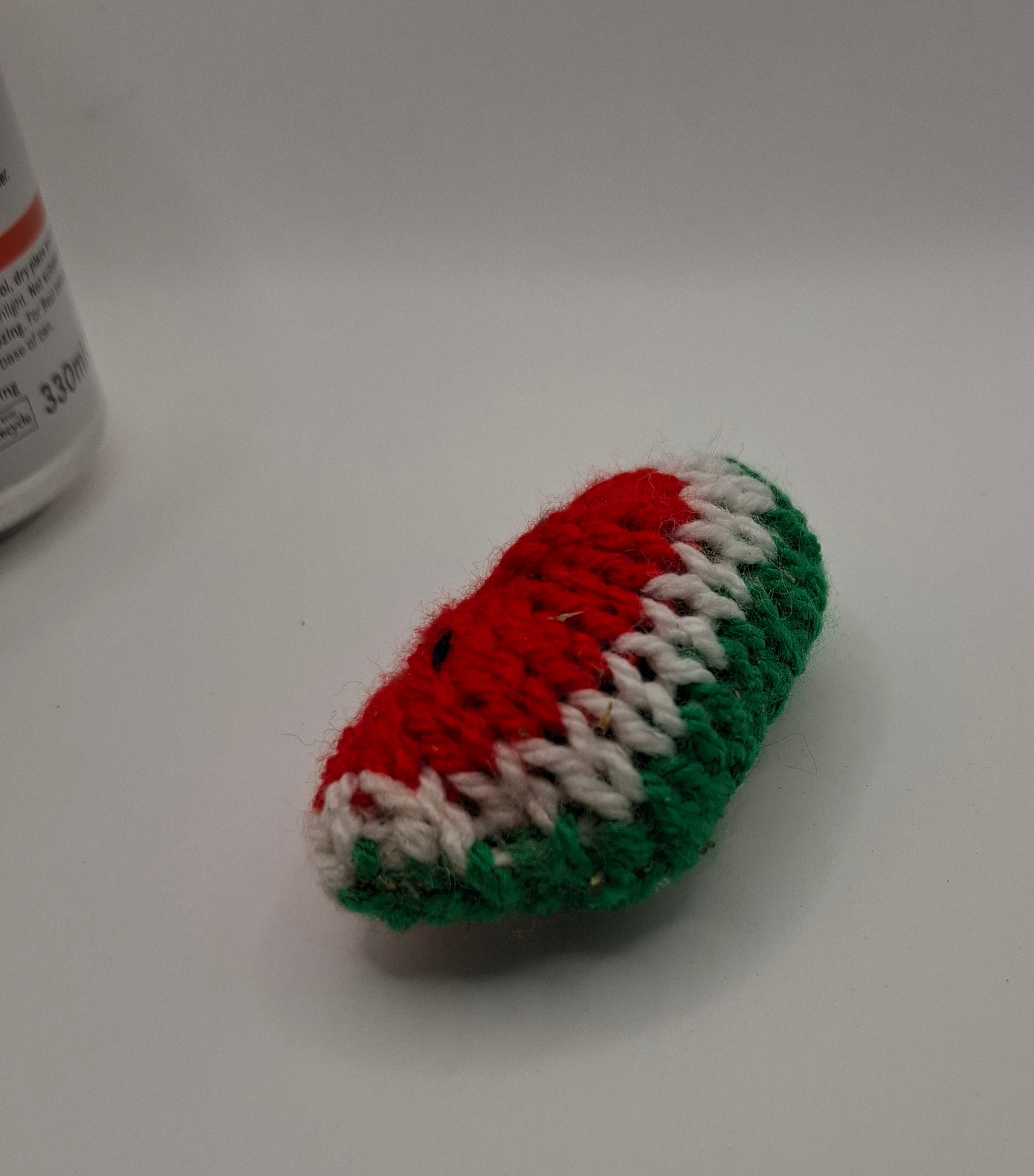 Knitted catnip toy melon slice