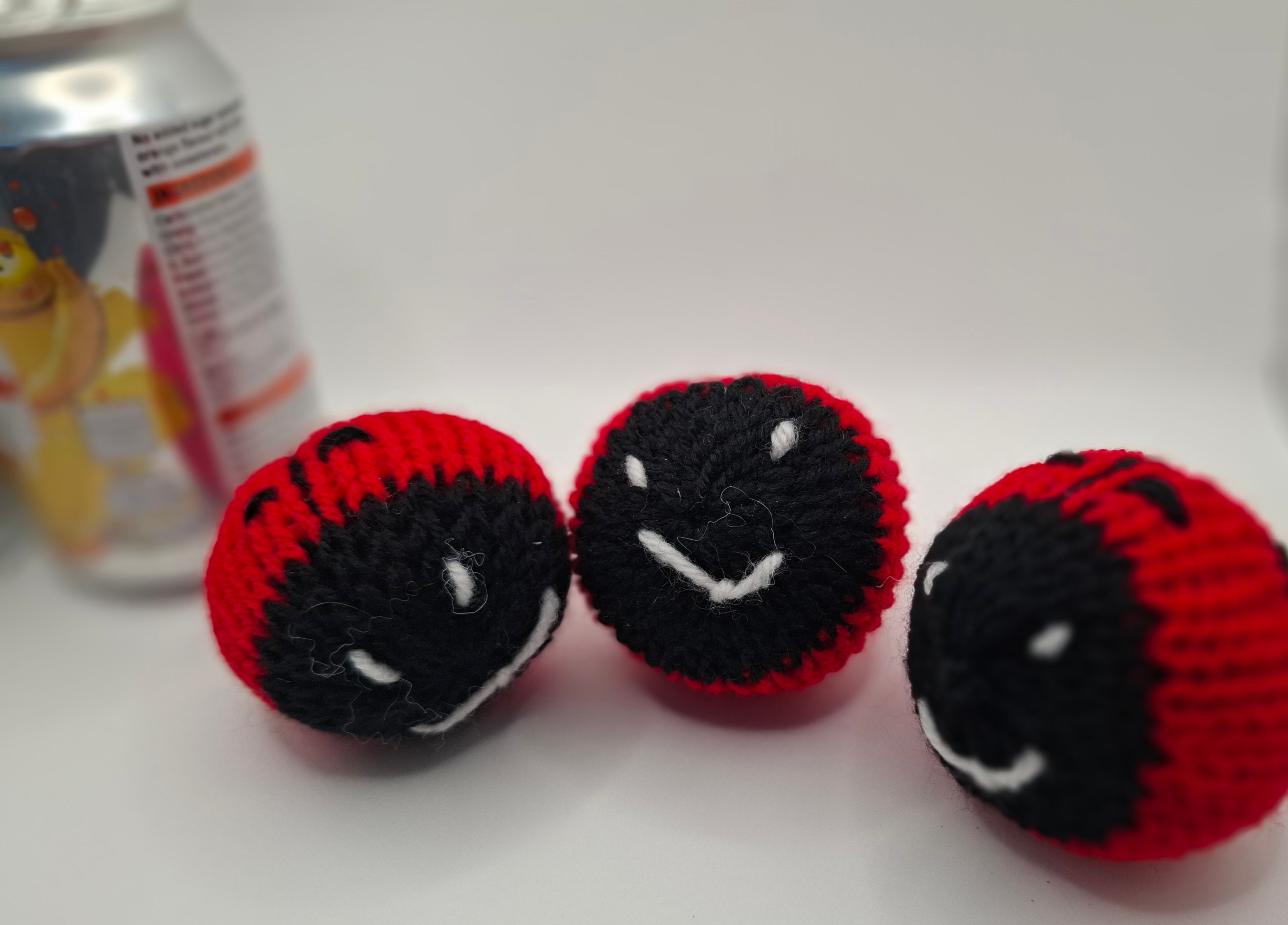 Knitted ladybird catnip toy