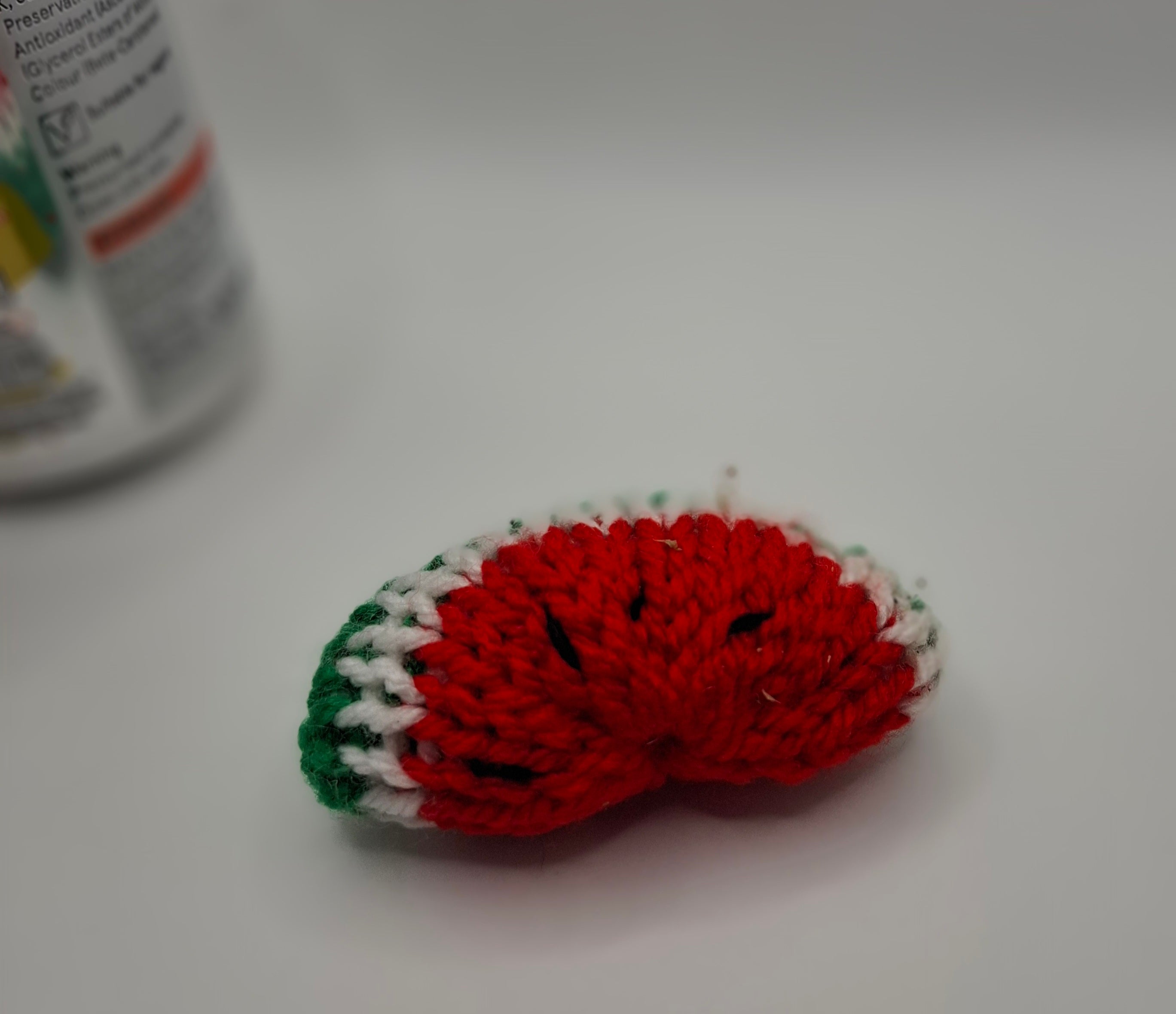 Knitted catnip toy melon slice
